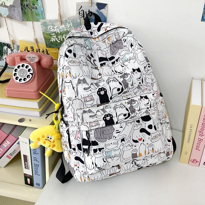 New high-value niche personalized graffiti comics trendy cool backpacks for men and women lightweight large-capacity backpacks