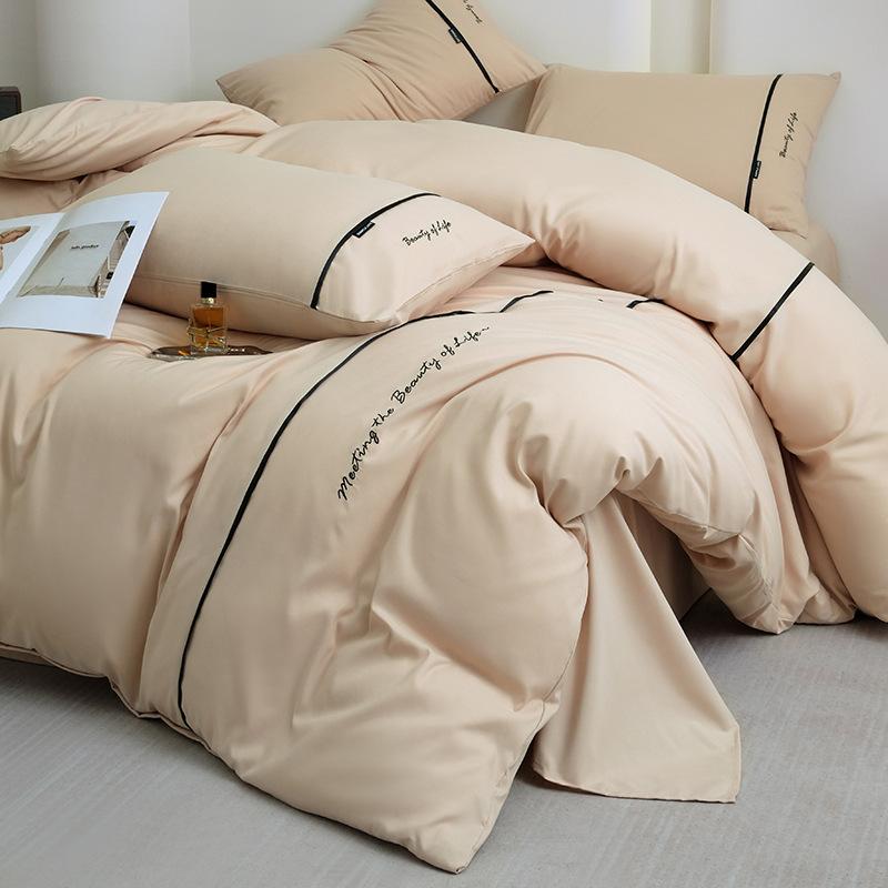 2025 new solid color embroidered ribbon double-spell skin-friendly washed cotton 4-piece set bed sheet and fitted sheet style