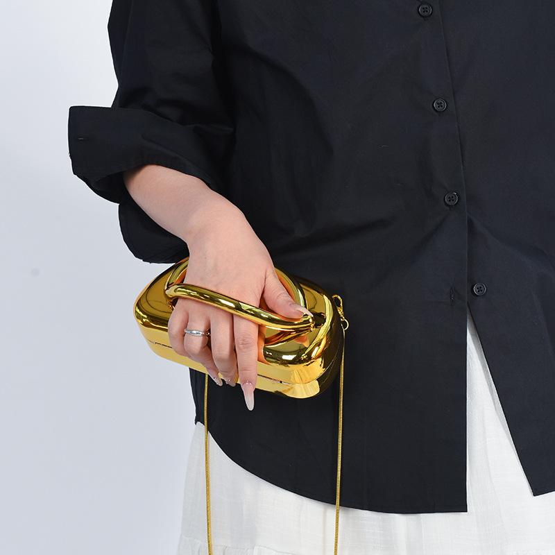 Handbag damska z handlu zagranicznego 2025 nowa europejska i amerykańska moda metalowa torebka na nadgarstek spersonalizowana błyszcząca łańcuszkowa listonoszka torebka wieczorowa