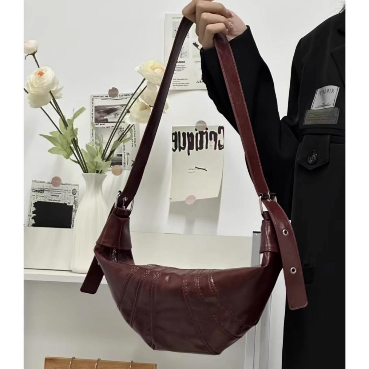 

Новый круассан сумка-круассан нишевая нагрудная поясная сумка универсальная одноплечевая кожаная сумка женская сумка-мессенджер сумка-пельмень бордовый