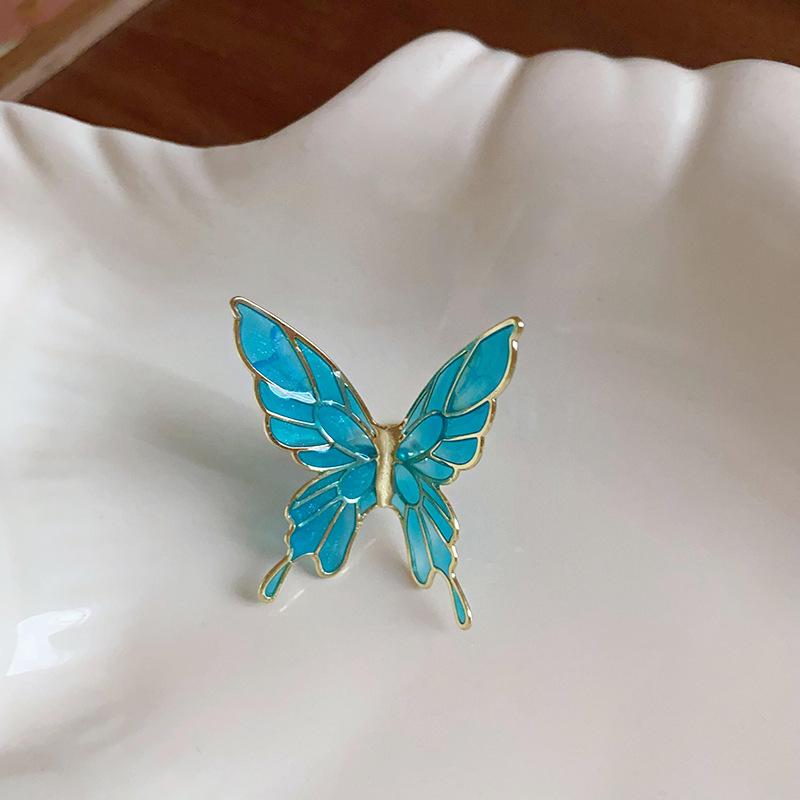 

Super fairy butterfly oil dripping ear clips niche fashion versatile design earrings temperament light luxury pastoral earrings