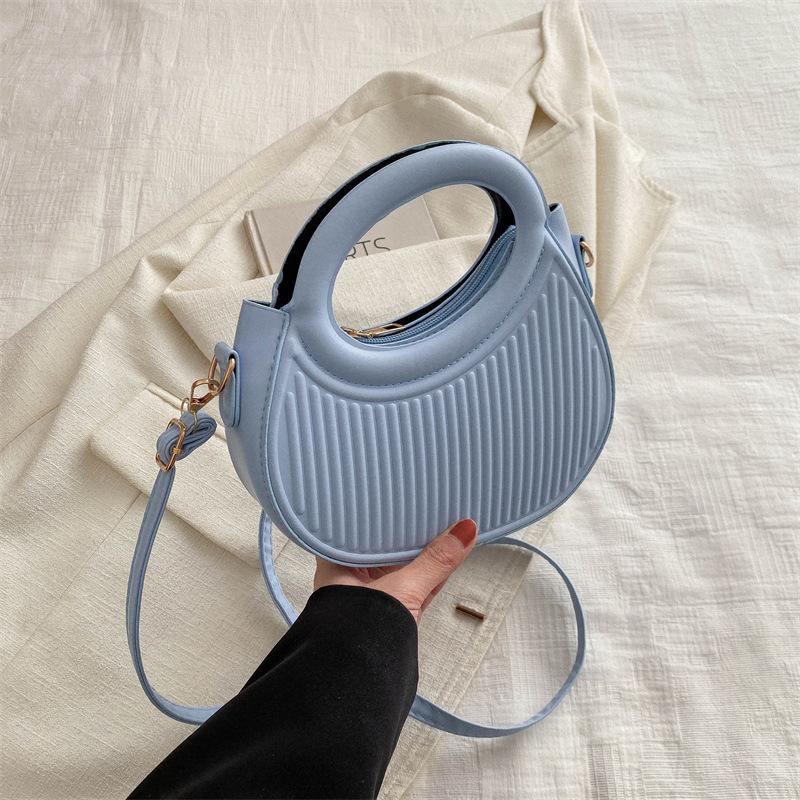 Solid color handbag women's 2025 early new fashion casual messenger bag portable small bag