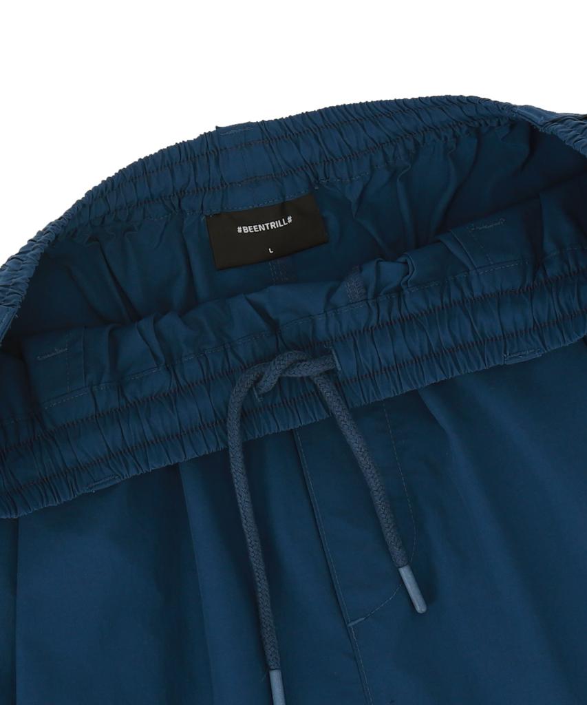 BEENTRILL One-Pleat Cuff Oversized Shorts (Indigo)
