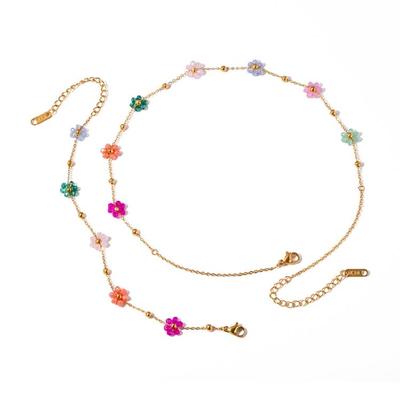 Modisches Statement mit bunten Blumenperlen Stabiles Stahl-Halsketten- und Armband-Set für stilvolle Outfits Trendsetter