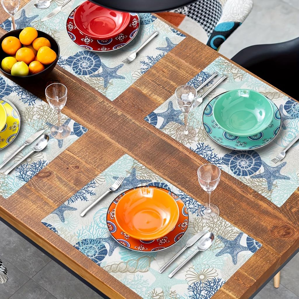 Set of 4 Summer-Themed Placemats Featuring Ocean Designs, Including Starfish And Seashells. These Washable, Non-Slip, And Heat-R