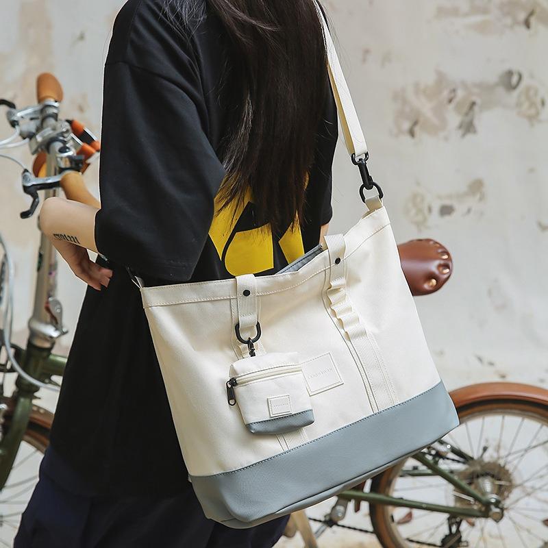 Backpack women's new women's large-capacity laptop bag men's and women's briefcase schoolbag commuter backpack