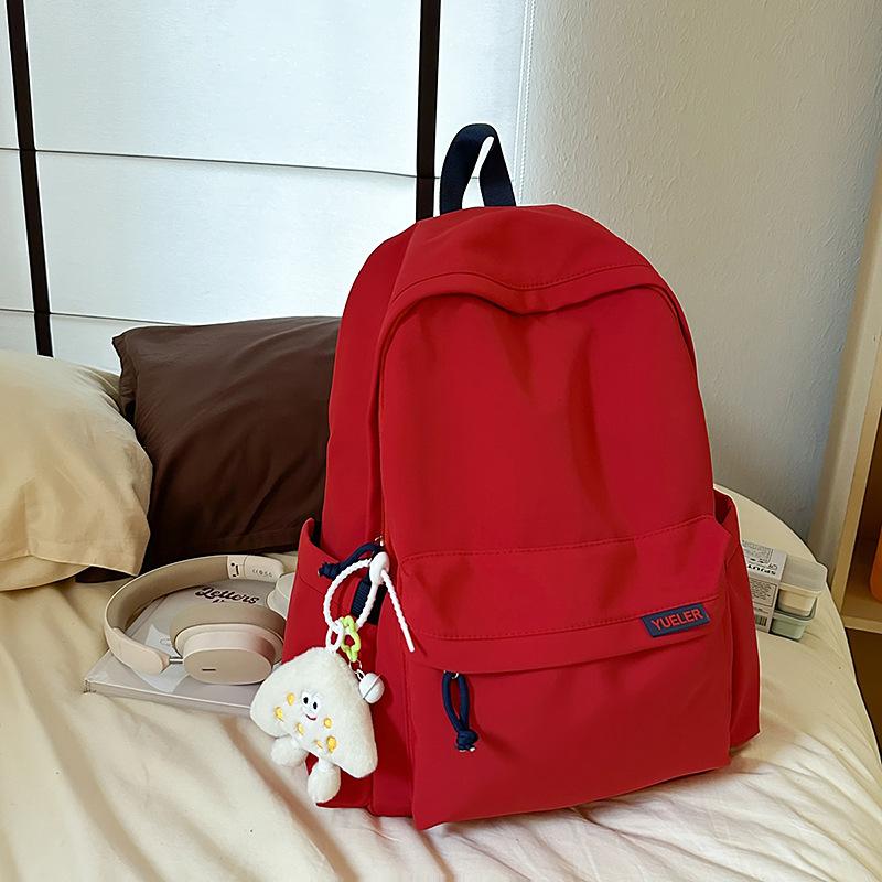 

Large Capacity Waterproof Backpack Versatile High Value Elementary School Travel Backpack with pendant