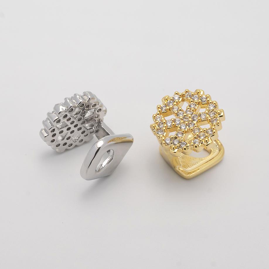 18K Gold Zirconia Snowflake Grillz with Openwork Design.