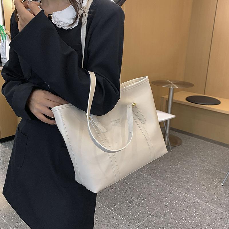 Contrasting color retro large-capacity bag women's autumn and winter new trendy tote bag student leisure commuter bag