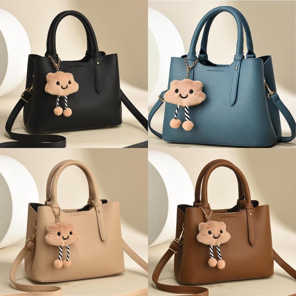 Classy Pu Handbag With Trendy Stone Texture And Ample Room For Daily Essentials