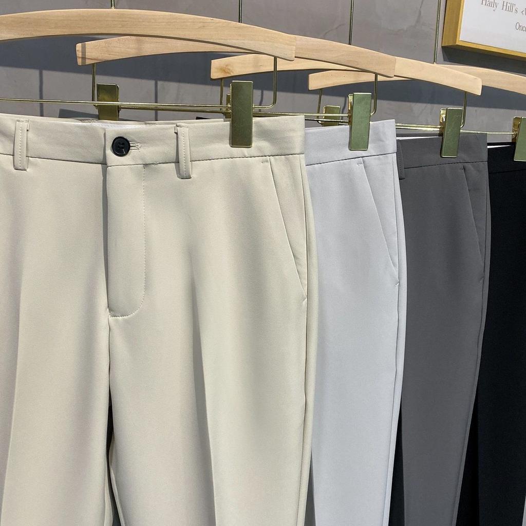 Wiosenne letnie męskie spodnie garniturowe Slim Fit Work Elastyczny pas Jogging Spodnie biznesowe Męskie czarne Plus Size