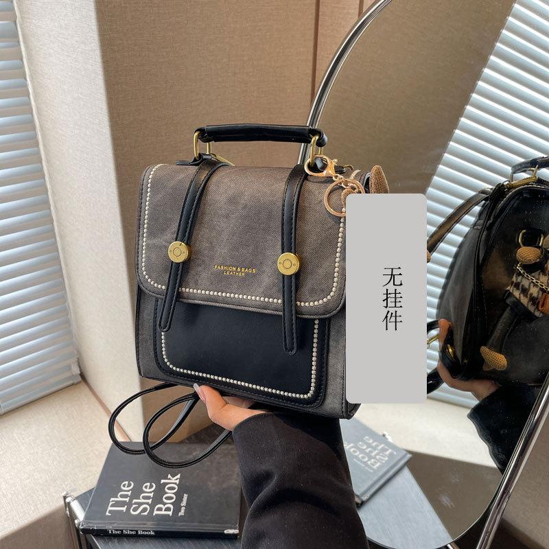 

Нишевый дизайн ручной рюкзак женский 2025 новый модный и универсальный на плечо кроссбоди сумка высококлассный рюкзак