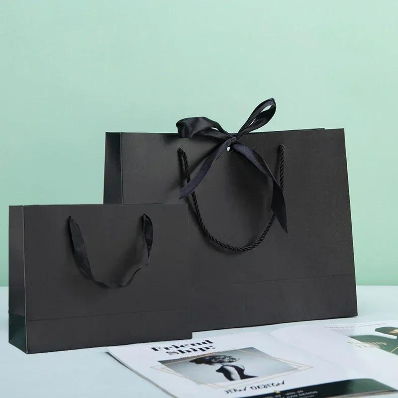 White Paper Jam Handbag Kraft Paper Thick Waterproof Frame Rivet Handle Gift Bag Cosmetic Clothing Store Portable Packaging Bags