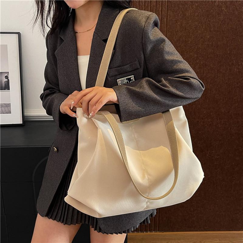 Simple large-capacity tote bag, student class canvas bag, shoulder bag, commuting versatile casual solid color handbag, women