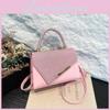 Contemporary Small Handheld Square Bag For Women Featuring Stylish Stitching Details