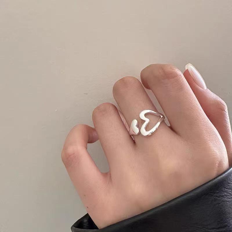 2025 Women's Adjustable Hollow Heart Ring: Stylish & Personalized Design