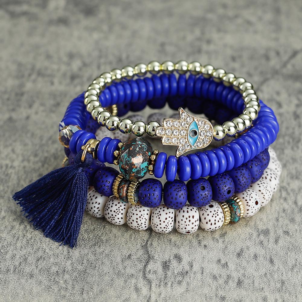 Bracelet bohème multicouches en perles avec pompon et motif palmier contre le mauvais œil pour homme et femme