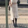 Elegant French White Irregular Half Skirt with Flowing Drape, Side Tie, and Low Waist Design