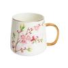 Qianxing Ceramic Plum Blossom Mug with Gold Handle