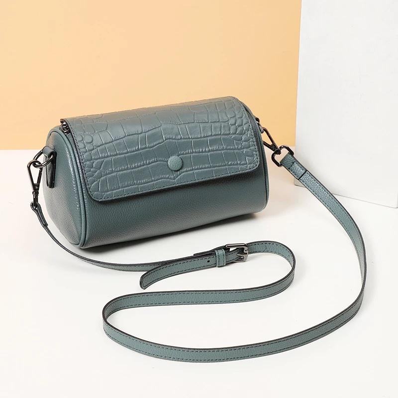 Women's bag real cowhide cylinder bag new niche messenger bag plus