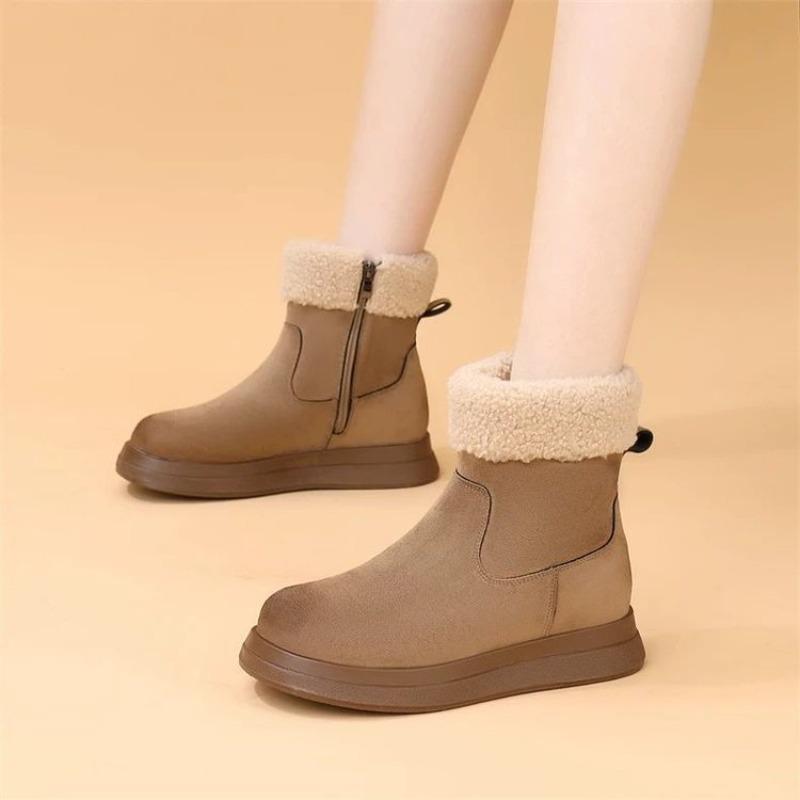 A Woman Is Wearing Fashionable and Casual Fleece Warm Snow Boots and Round-toed Cotton Shoes