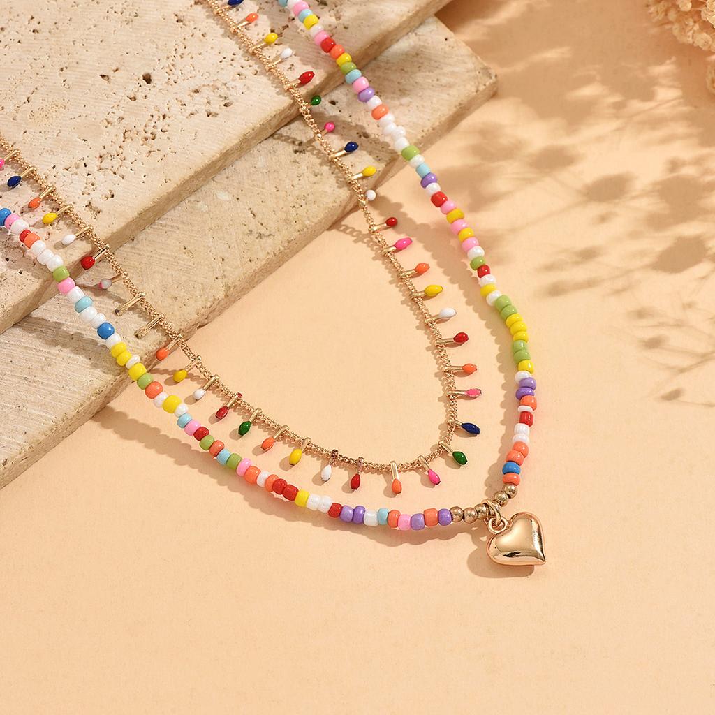 Mehrschichtige Regenbogen-Glasperlen-Choker-Halskette für Damen mit Herz-Anhänger Boho Strand Verstellbar Sommer Mode Schmuck