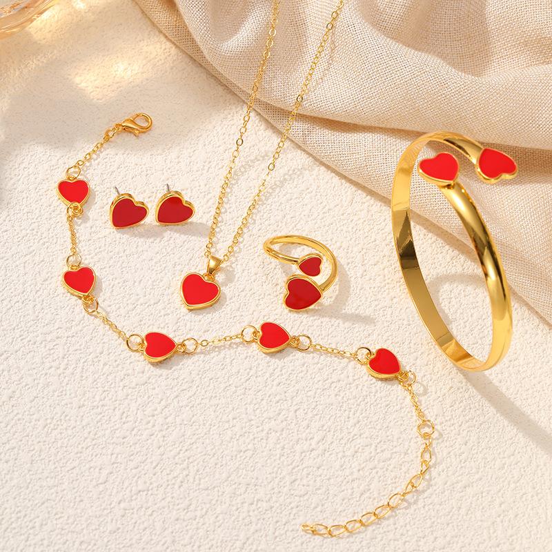 

Горячая Распродажа Набор Ювелирных Изделий Любовь Персиковое Сердце Браслет Браслет Серьги Ожерелье Кольцо Женские Ювелирные Изделия