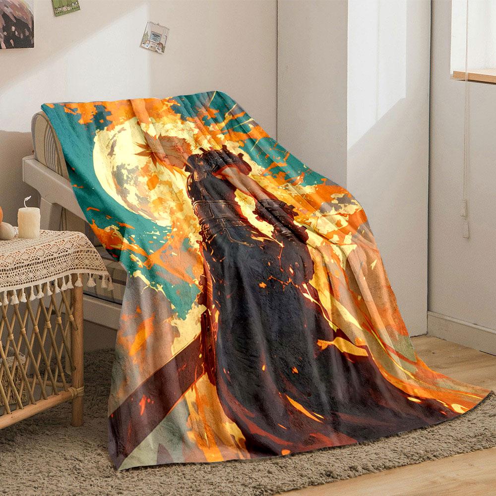 Fiery orange splashes surround a figure with spiked hair under a glowing moon. for all seasons blanket lunch break throw gift