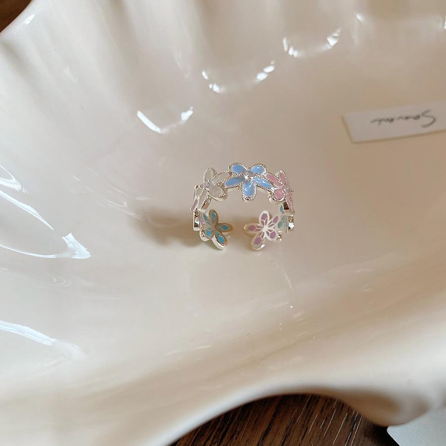 

Zir*****il drop flower pearl opening ring sweet ins niche design index finger ring light luxury jewelry