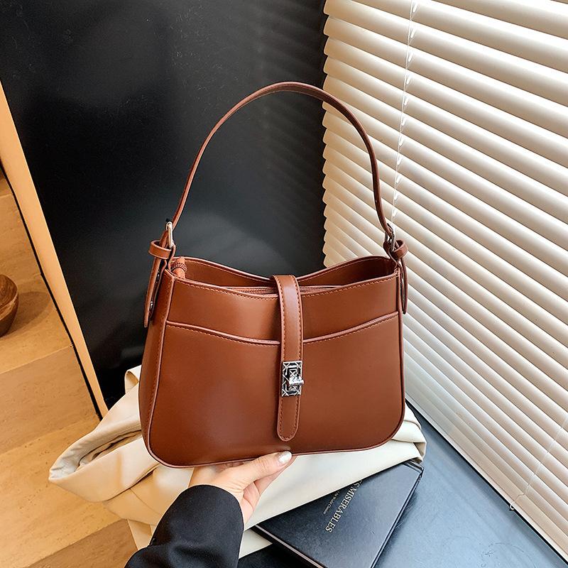 

Niche bag women s new high-end casual portable underarm bag versatile fashion shoulder bucket bag коричневый