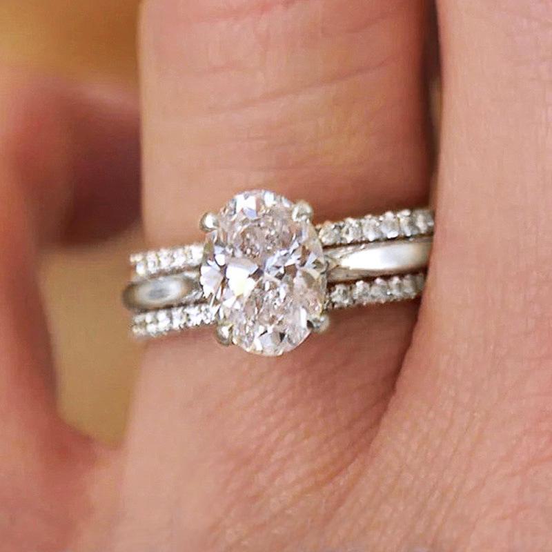 

Cao Shi Luxury Four-Prong Oval Zirconia Wedding Ring Set - Three-Piece Design for Women Size 10