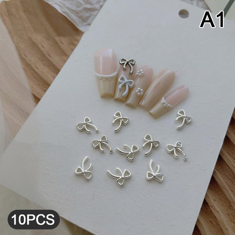 

10 шт. галстук-бабочка сплав разноцветные 3D полые подвески для ногтей маникюр арт-декор DIY материалы аксессуары подарок as the picture