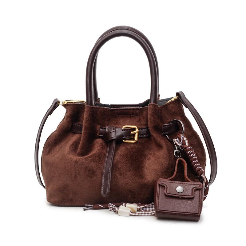Suede bag women's autumn and winter 2025 new niche design retro shoulder messenger bag pleated portable bucket bag