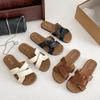 Shit wear sandals design women's seaside beach shoes step on the run-off niche summer soft-soled slippers new women's shoes