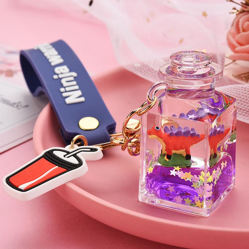Creative Quicksand Little Yellow Duck Dinosaur Perfume Bottle Backpack Pendant Acrylic Accessory