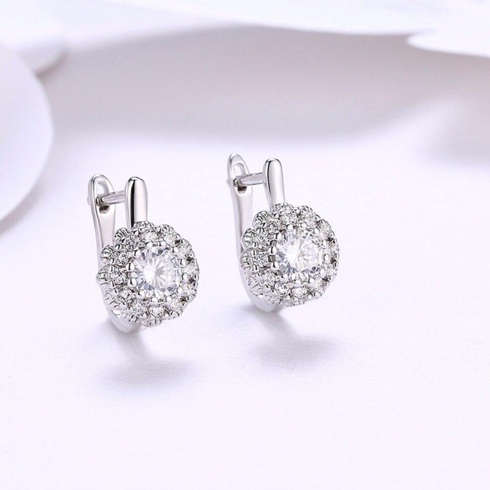 

Luxurious Female White Cubic Zircon Stone Buckle For Women Stud Earrings Rose Gold Color White Color Earrings JewelryLuxury Stud