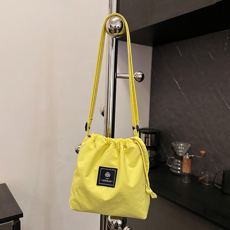 Mobile phone bag women's simple versatile drawstring messenger bag trendy brand shoulder bag leisure sports nylon bag