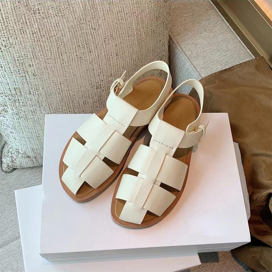 Sheepskin version~ thick-soled woven sandals women's summer one-word buckle belt hollow breathable pig cage shoes flat Roman shoes