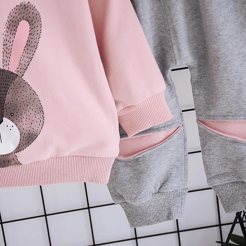 Completo da ragazza casual alla moda carino con stampa di cartoni animati, maglione a maniche lunghe con scollo rotondo e pantaloni