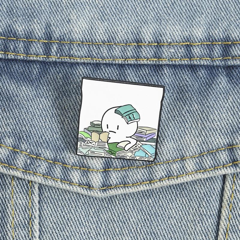 Cartoon Overwhelmed Book Lover Enamel Pin Exaggerated Figure Buried In Books Lapel Brooch Humorous Gift For Teens