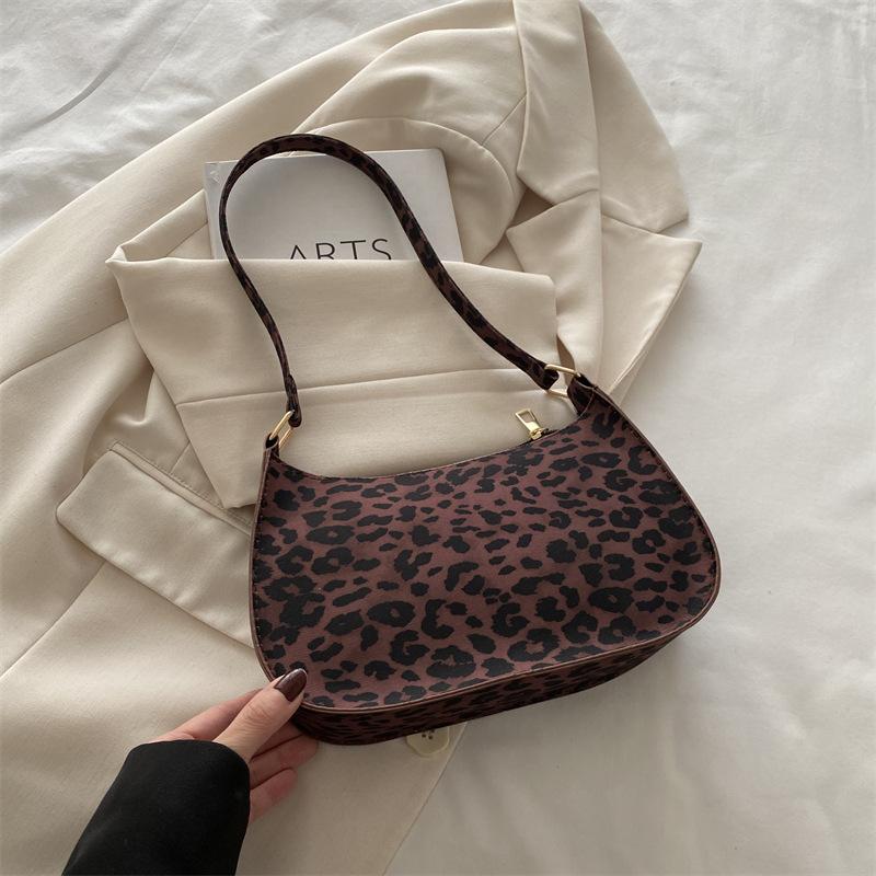 

2025 осень и зима досуг новый зарубежный стиль мода личность нишевый дизайн простой подмышечный плечевой кроссбоди сумка-полумесяц