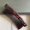 Tan Mujiang Rosewood Inlaid Comb with Fish Design