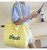 Einfarbige Damen Strand-Schultertasche mit Buchstaben-Design, Damen-Tote aus Canvas, Große Kapazität, Kordelzug, Damen-Einkaufstasche