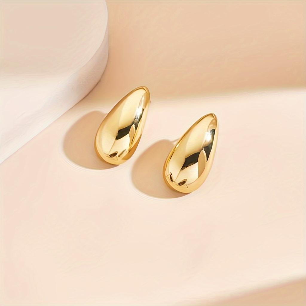 Unique Golden Color Waterdrop Shaped Earrings Personalized Stud Earrings Fashionable Ear Jewelry for Women Girls Suitable for All Seasons