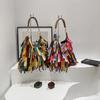 Niche design large-capacity underarm shoulder bag female personality Indian style fringed commuter messenger bag