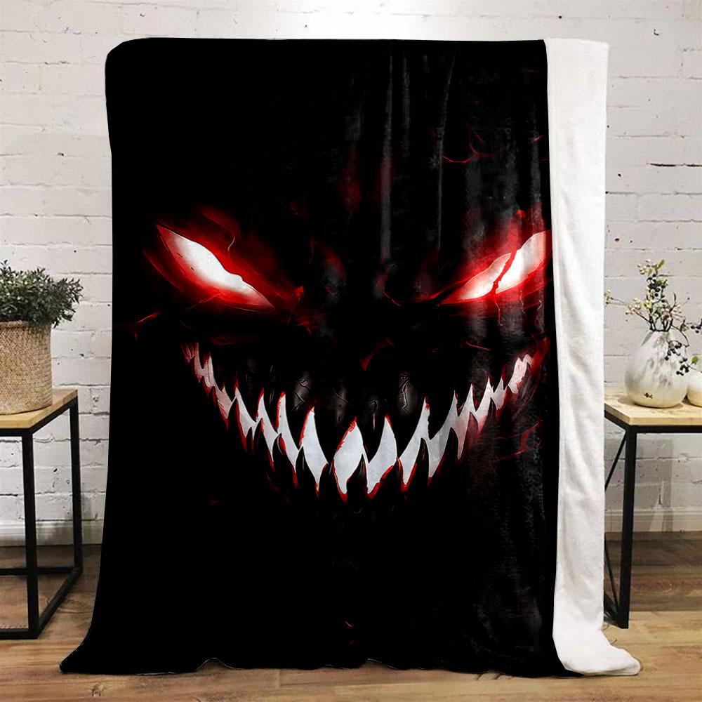 Sinister, glowing red eyes and sharp white teeth in a dark background. for all seasons blanket lunch break throw gift