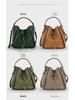 Women's Retro Rivet Cowhide Bucket Bag with Leopard Head Design