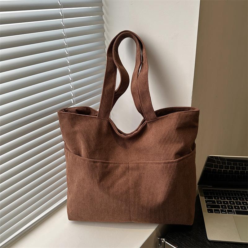 

Solid color literary and leisure Korean version of the new commuter tote bag for women s autumn and winter large-capacity students in class trendy sho коричневий