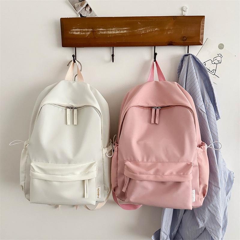 New solid color large-capacity simple casual Oxford cloth student class schoolbag men's and women's casual backpack