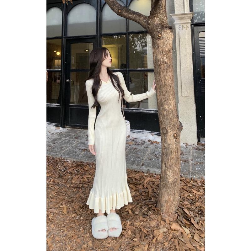 Skinny and tall long-sleeved hip-wrapped fishtail knitted skirt women's autumn new temperament gentle wind long dress
